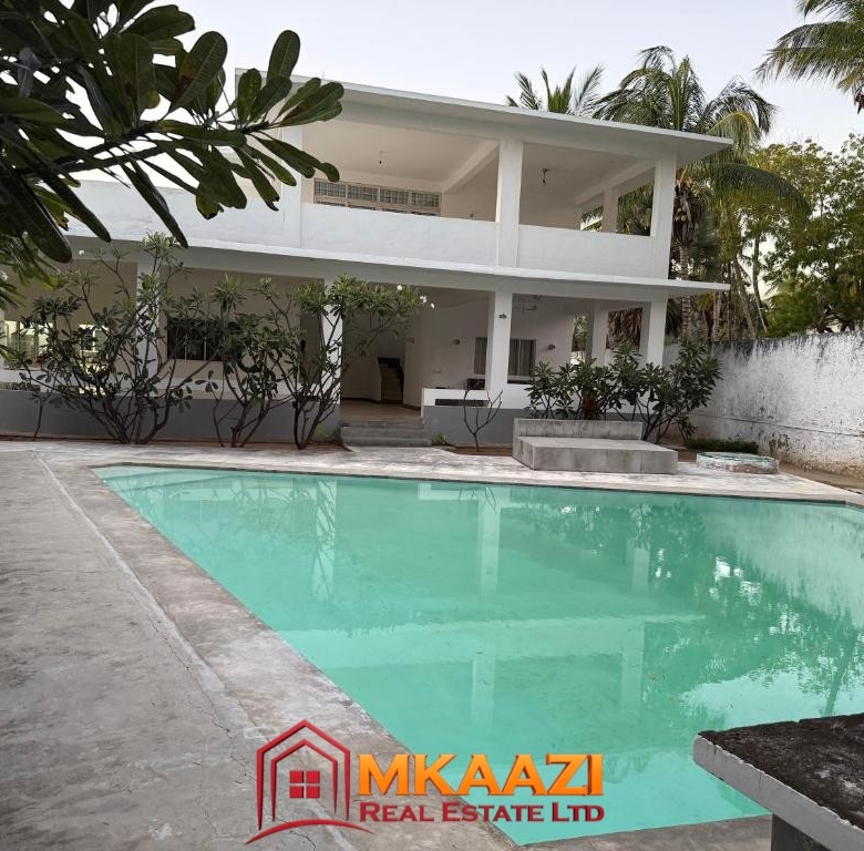 Enjoy a refreshing swim and relax by the private pool during your beachfront stay in Mambrui.