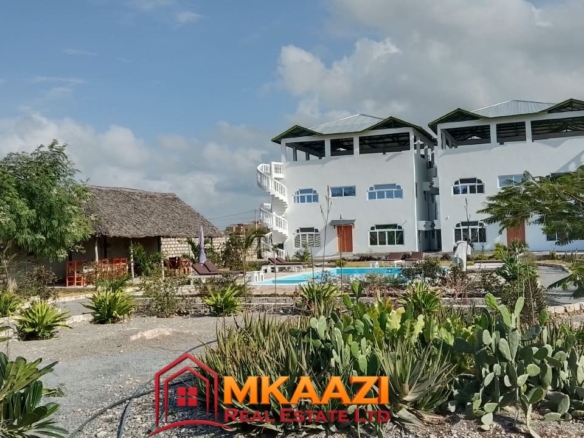 Fully furnished apartments for sale in Watamu on a 0.5-acre property near the beach.