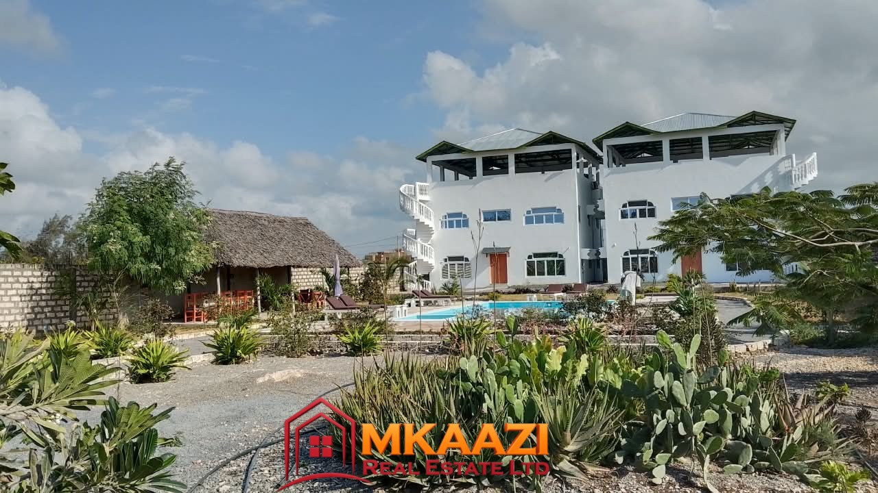 Acreage (3) Fully furnished apartments for sale in Watamu on a 0.5-acre property near the beach.