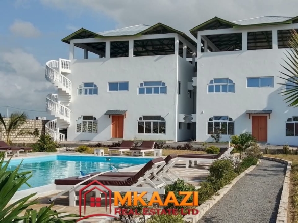 Shared swimming pool at fully furnished apartments for sale in Watamu on 0.5 acres.