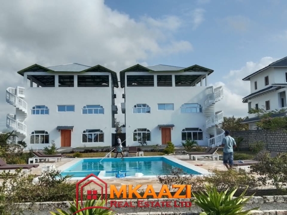 Spacious outdoor area at six apartments for sale on 0.5 acres in Watamu.