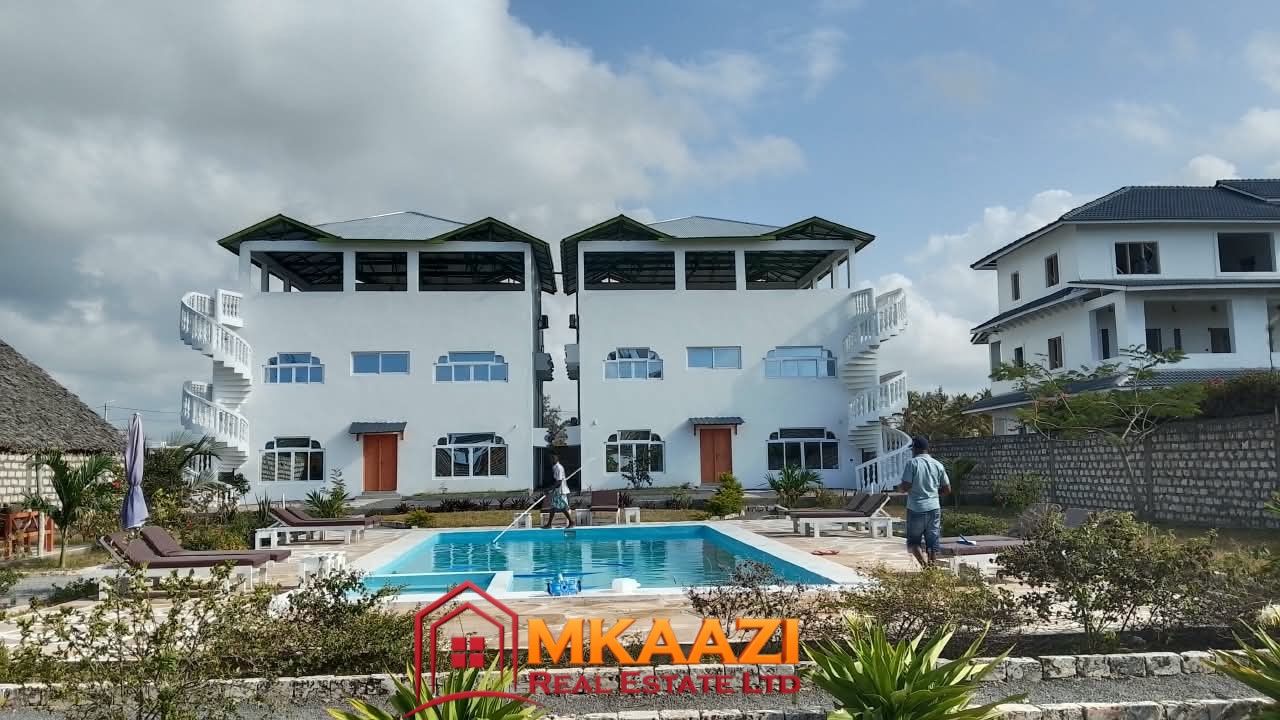 Acreage (7) Spacious outdoor area at six apartments for sale on 0.5 acres in Watamu.