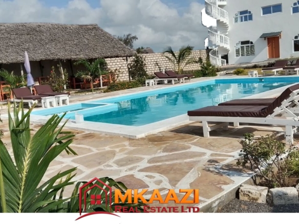 Shared swimming pool at fully furnished apartments for sale in Watamu on 0.5 acres.