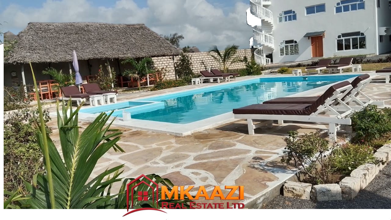 Acreage (9) Shared swimming pool at fully furnished apartments for sale in Watamu on 0.5 acres.