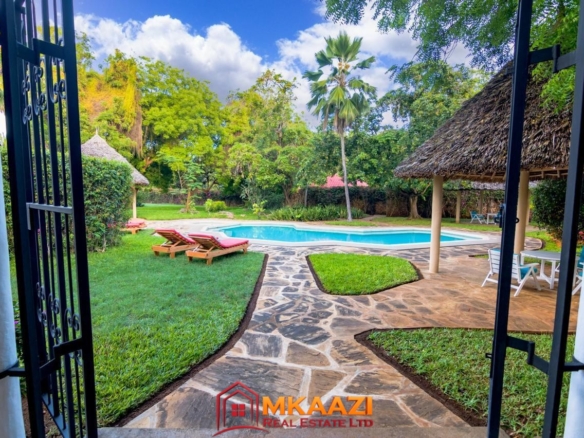 Swimming pool shared by three luxury bungalows in Silversands, Malindi