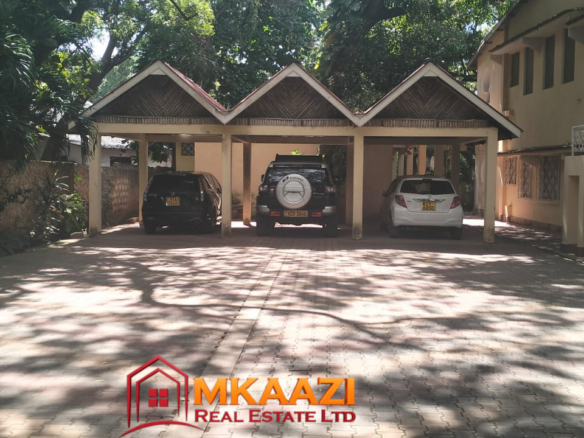 Secure parking area at Mango Plaza Apartments for residents and short-term guests.
