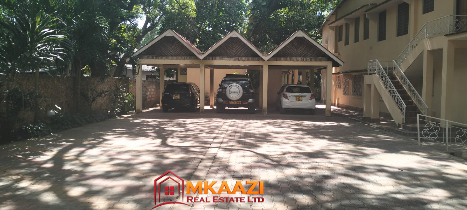 Mango Plaza 1br 1 Secure parking area at Mango Plaza Apartments for residents and short-term guests.
