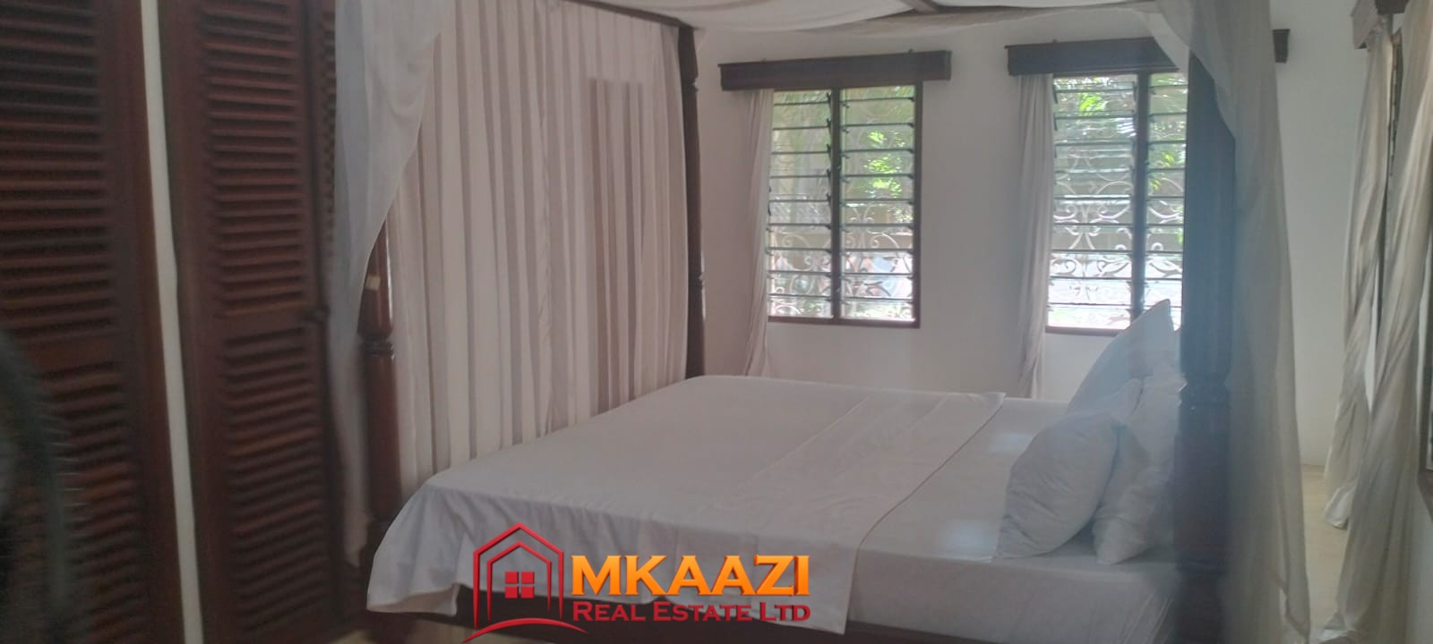 Mango Plaza 1br (10) Comfortable second bedroom in a fully furnished 2-bedroom apartment for rent.