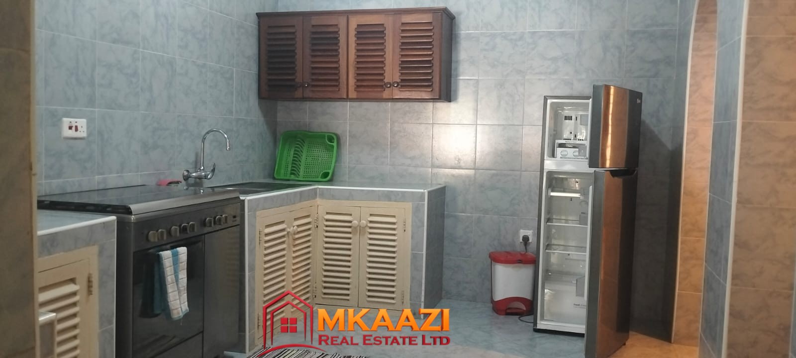 Mango Plaza 1br (11) Self-catering kitchen in a fully furnished 2-bedroom apartment at Mango Plaza Apartments.