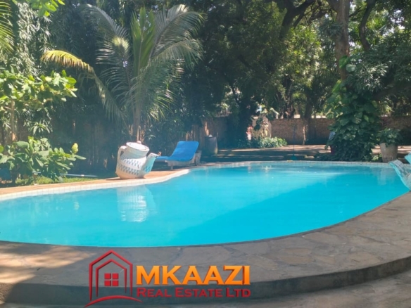 Swimming pool at Mango Plaza Apartments for guests staying in the furnished 2-bedroom apartment.