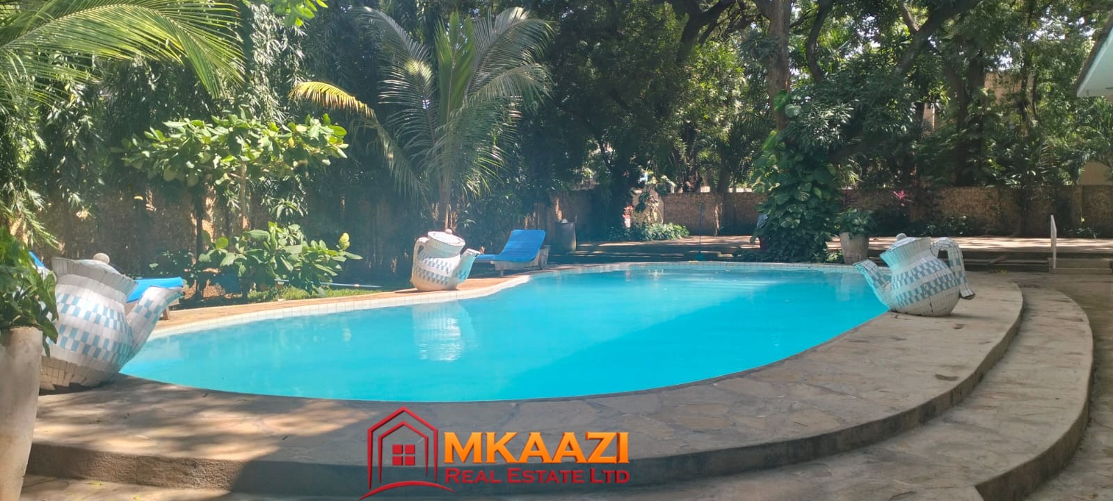 Mango Plaza 2br Swimming pool at Mango Plaza Apartments for guests staying in the furnished 2-bedroom apartment.