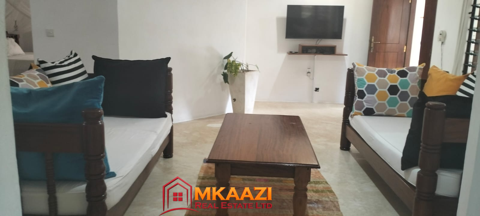 MangoPlz 8 Modern living room in a furnished apartment for rent in Malindi