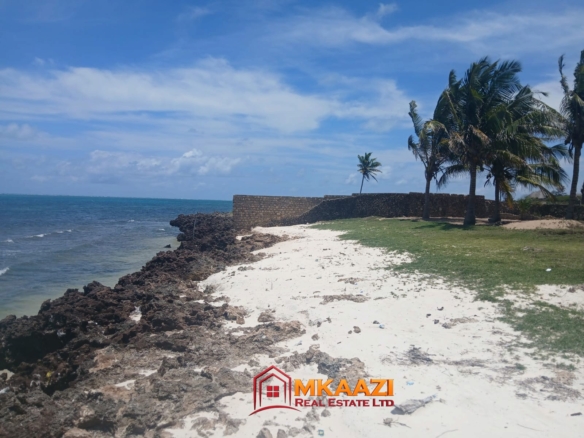 Beachfront property in Mayungu with a small domestic staff quarter