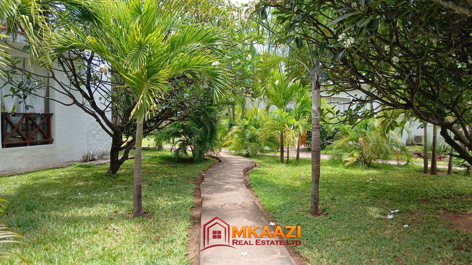 Three-bedroom furnished apartment with children's play area and walking trails